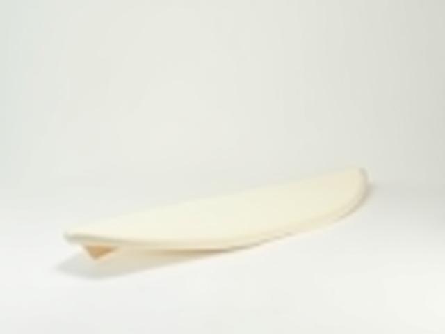 A wider, flatter groveler surfboard ready for small waves.